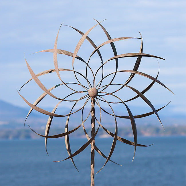 The Starburst Kinetic Foundation | 75" Steel Pinwheel Wind Spinner | Ancient Graffiti