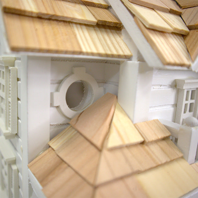 The “Cloud Gate” Cottage Bird House
