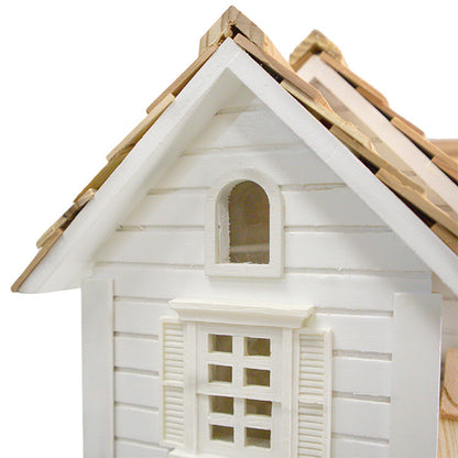 The “Cloud Gate” Cottage Bird House